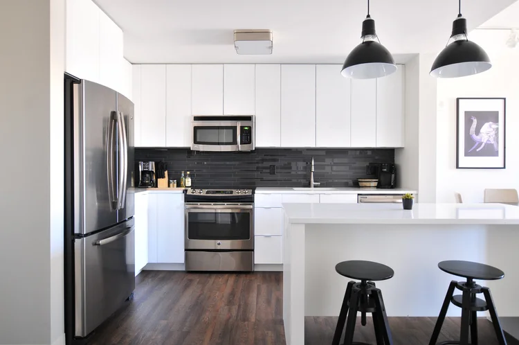 Restored kitchen interior with updated flooring and cabinetry